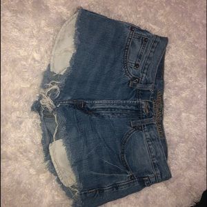 American eagle high rise distressed shorts.